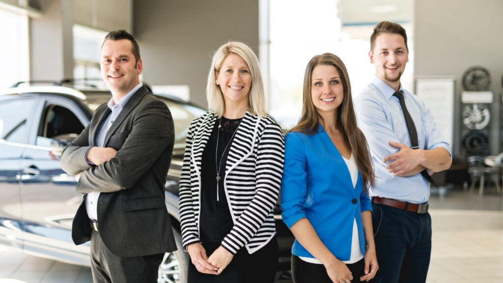 employee engagement survey group of happy dealership employees