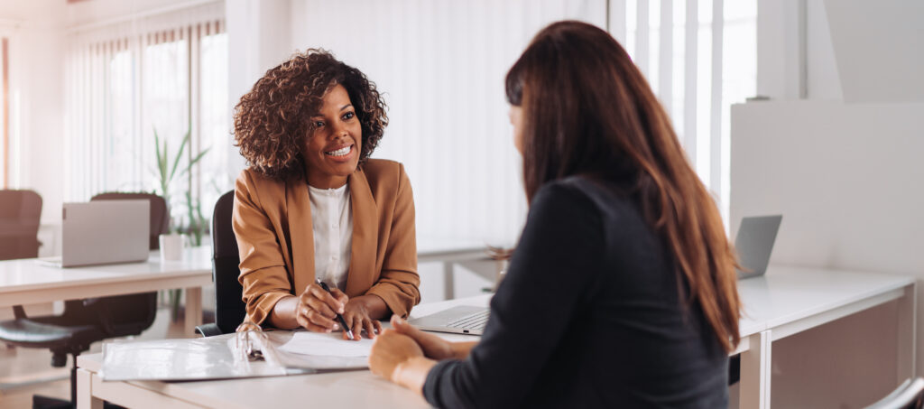 woman consulting with a female financial manager at the bank